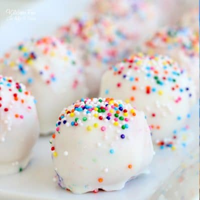 Animal Cookie Truffles combine yummy frosted animal cookies, cream cheese and chocolate. They're absolutely delicious and completely beautiful!