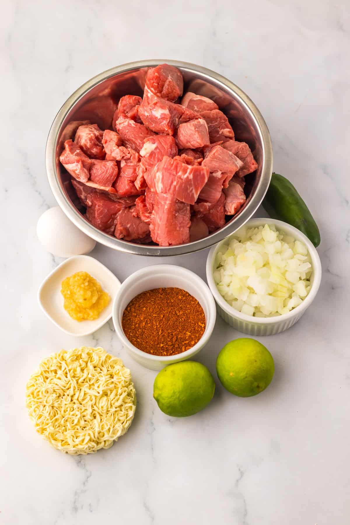 Overhead view of ingredients needed to make birria ramen