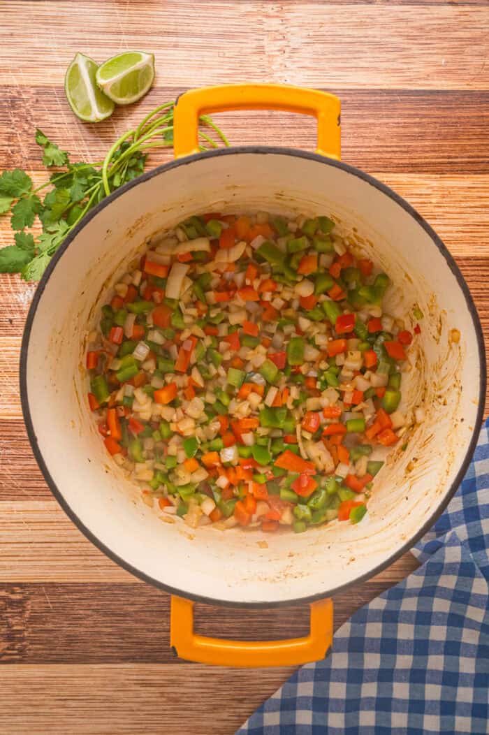 Bell peppers and onions in a Dutch oven
