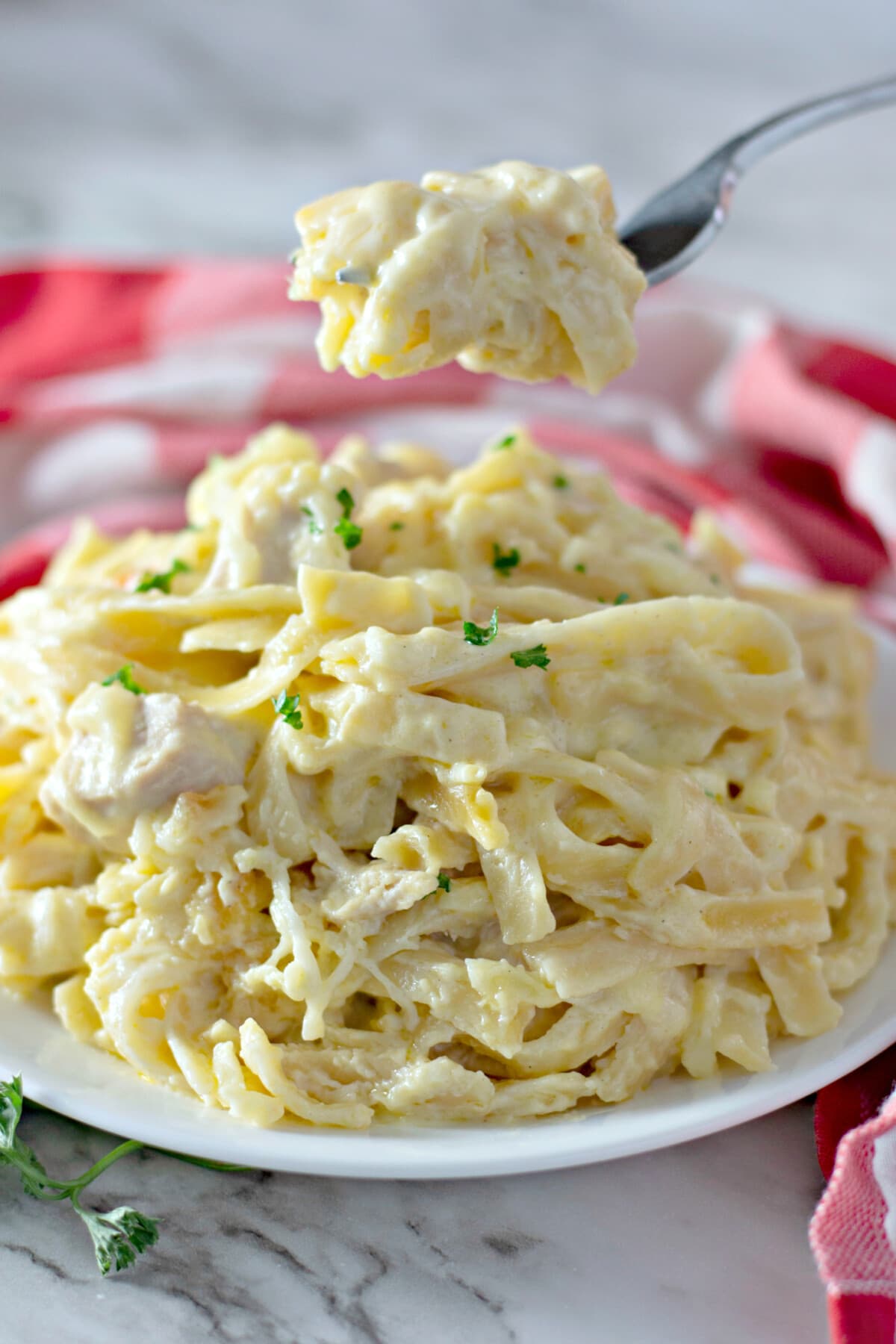 Chicken Tetrazzini on a plate with a fork