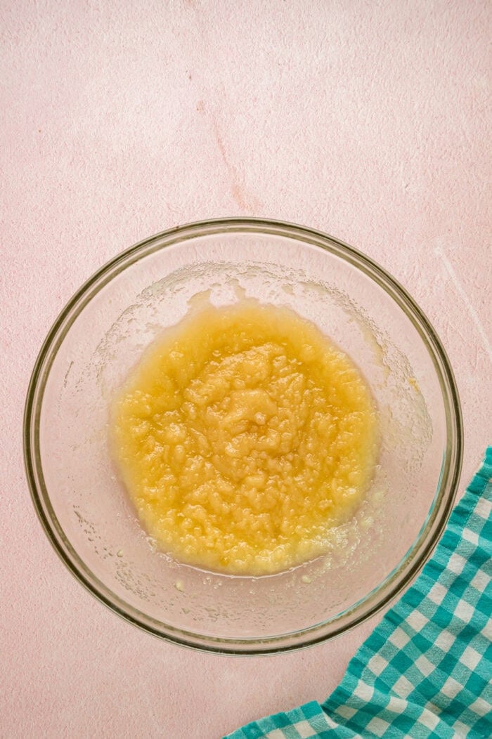 Sugar and melted butter n a bowl