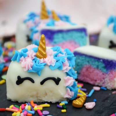 Easy Unicorn Petit Fours Recipe on a slate board.