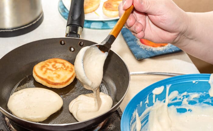 pouring batter into pan