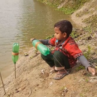 Little boy fishing.