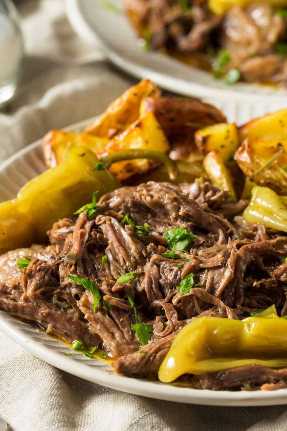 Mississippi Pot Roast on a plate with potatoes