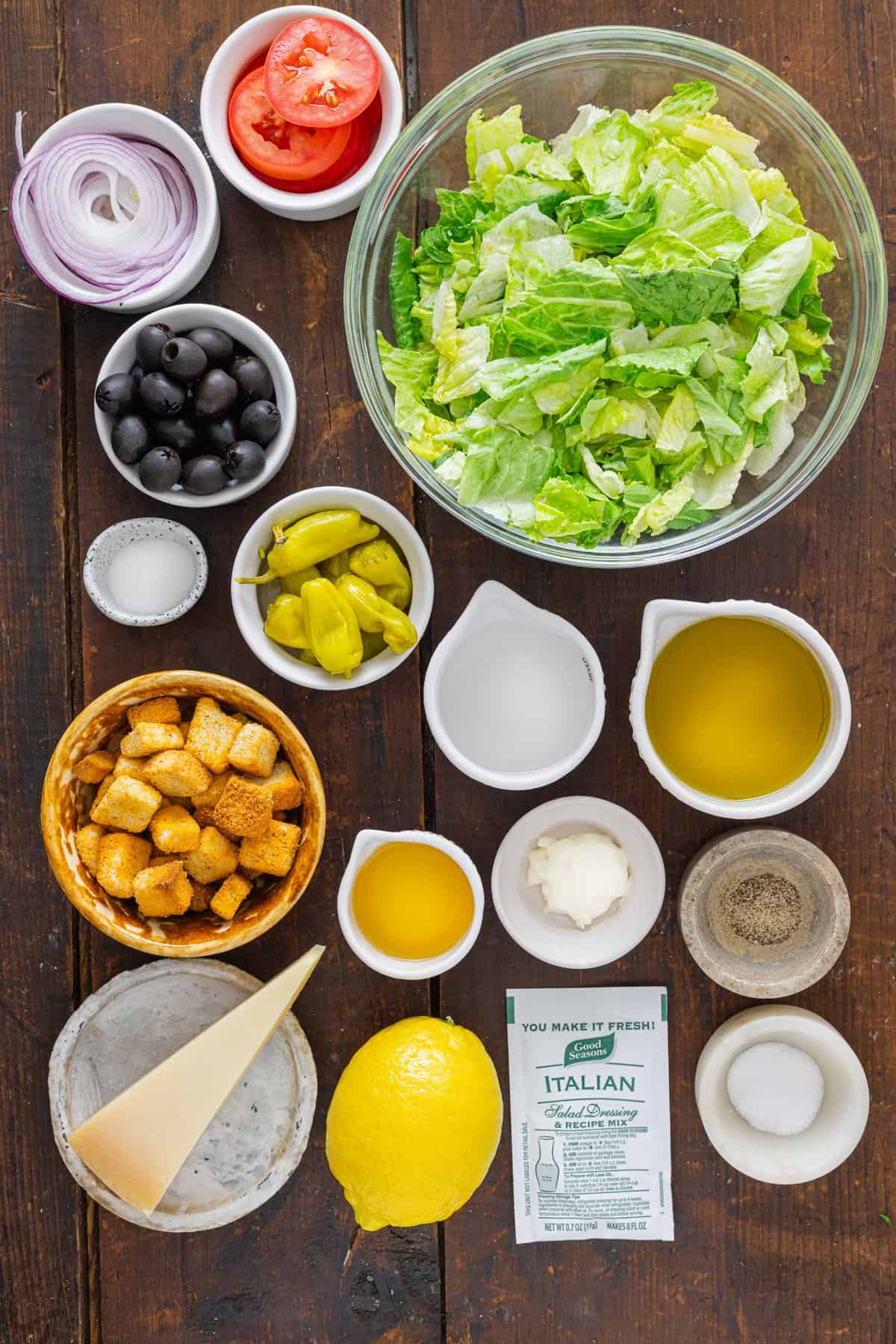 Overhead view of ingredients needed to make Olive Garden salad recipe