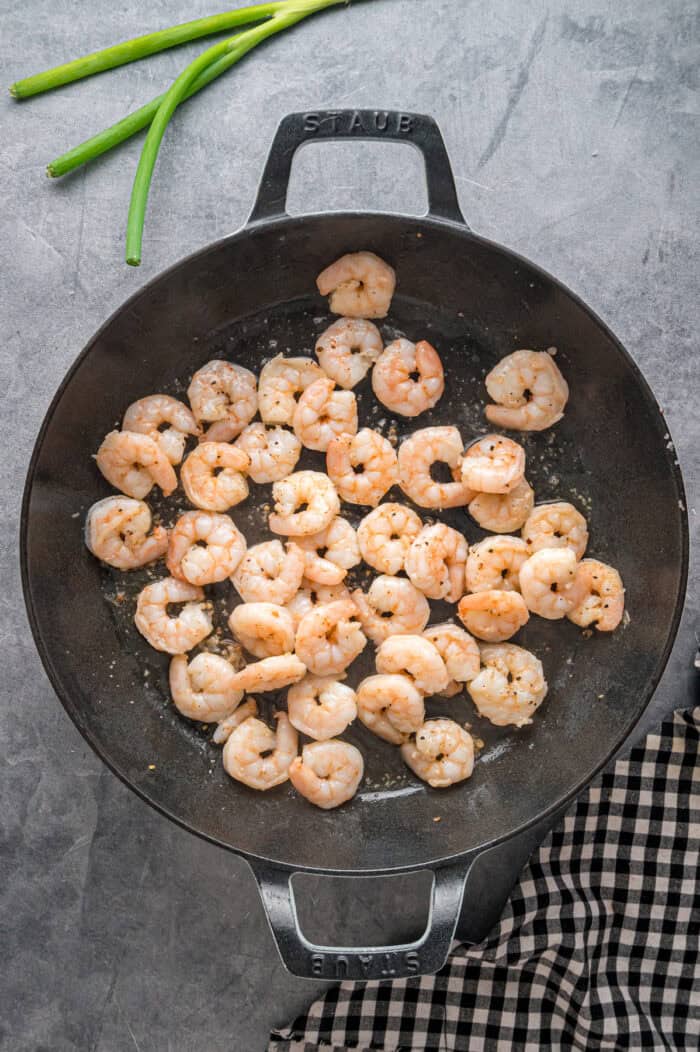 Shrimp cooking in a wok