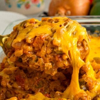Serving a spoonful of sloppy joe casserole