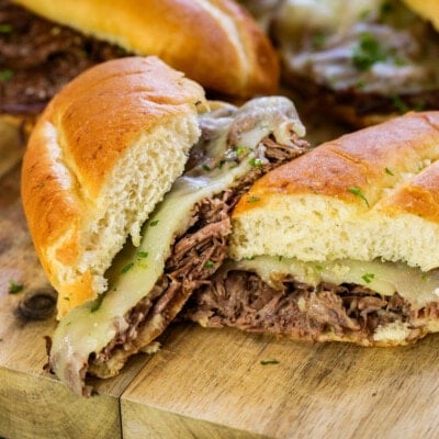 A slow cooker french dip sandwich cut in half